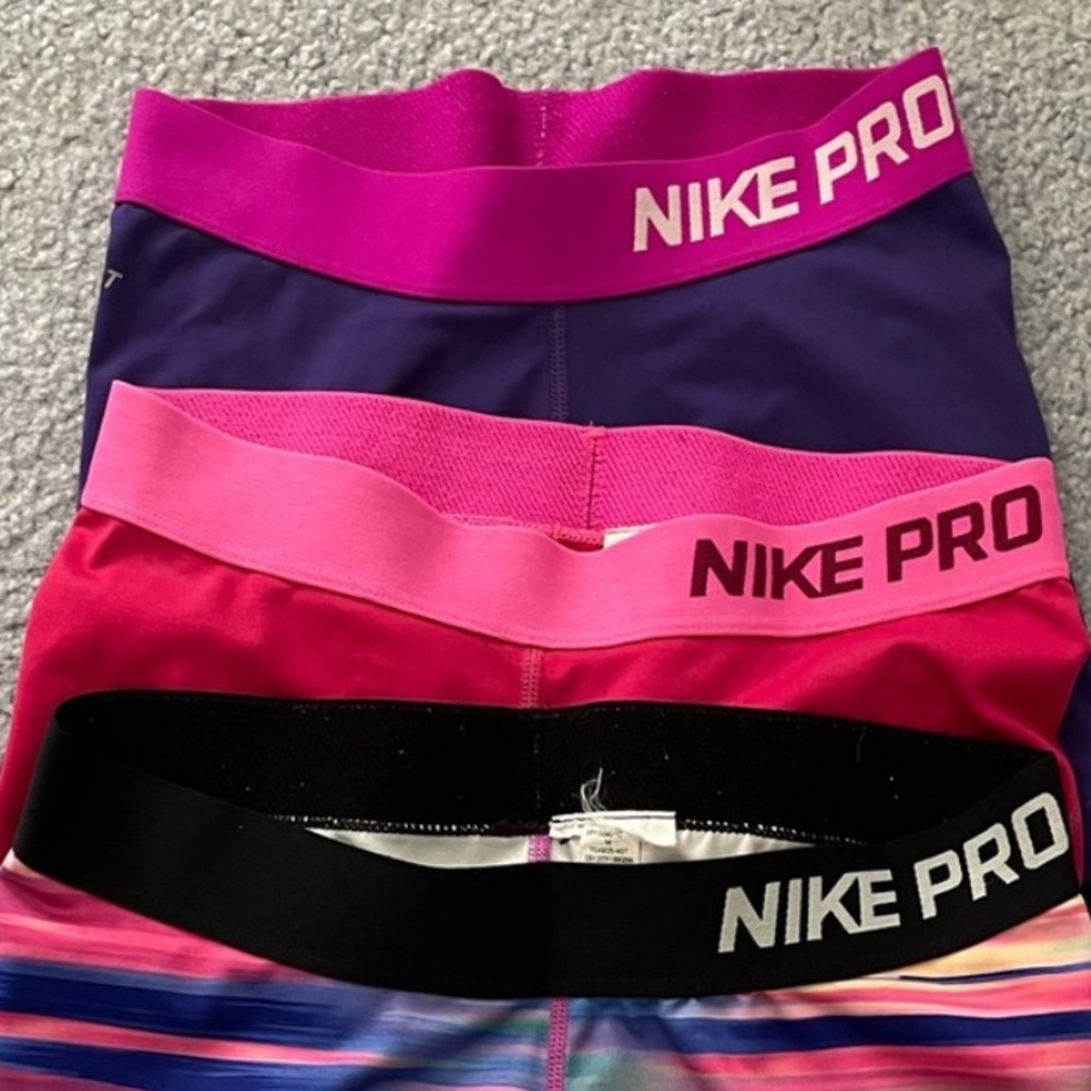 Pink and Purple Nike Pros (FOR BUYER)